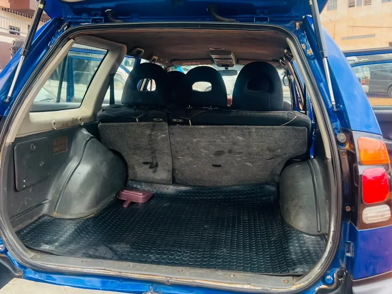 The open boot of the Pajero, with room for suitcases